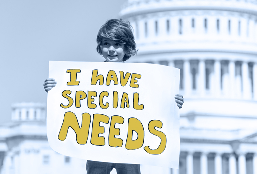 Boy in fount of the White House holding up a sing says I Have Special Needs